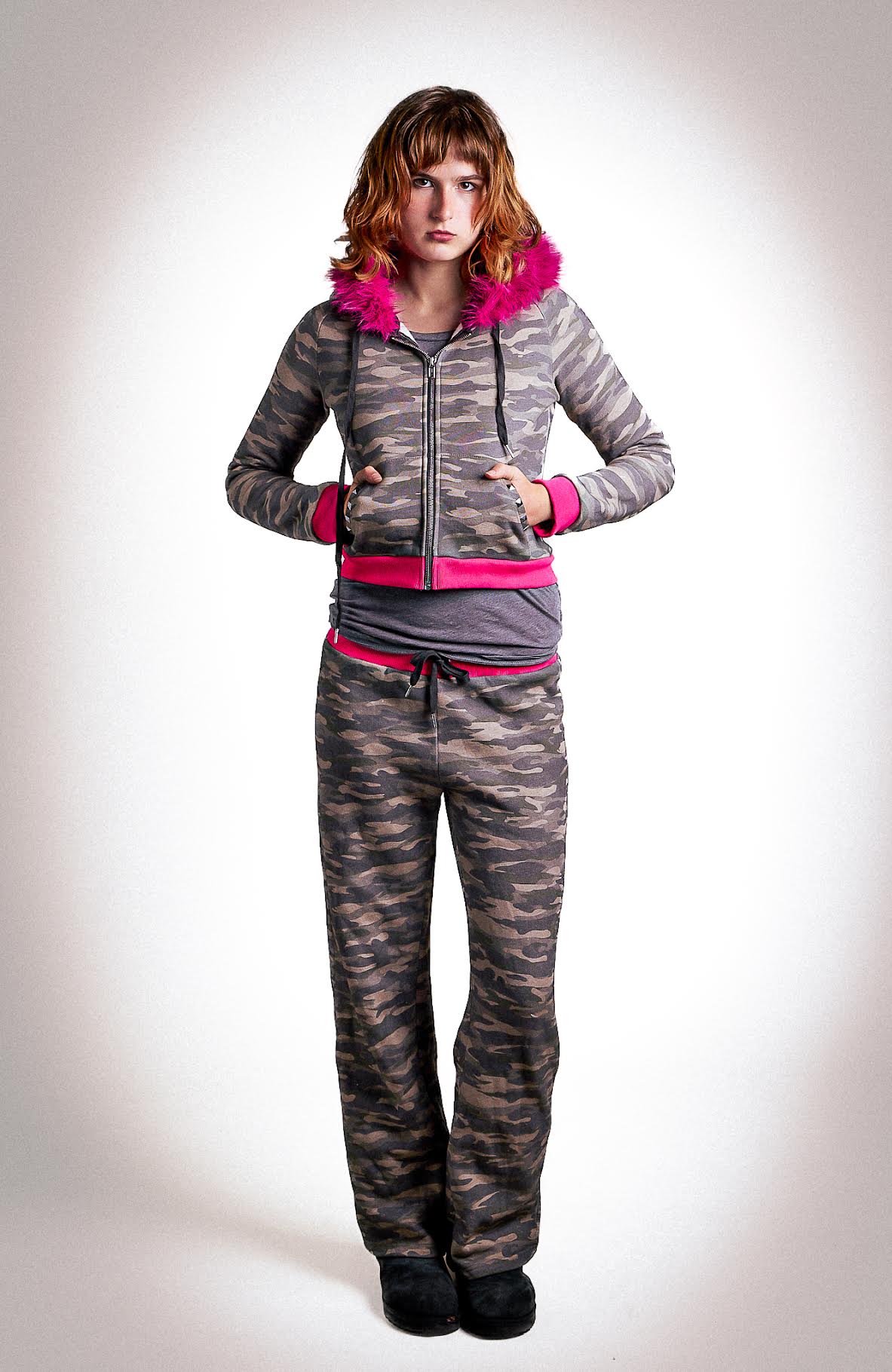 Low-waisted camo and hot pink sweatpants