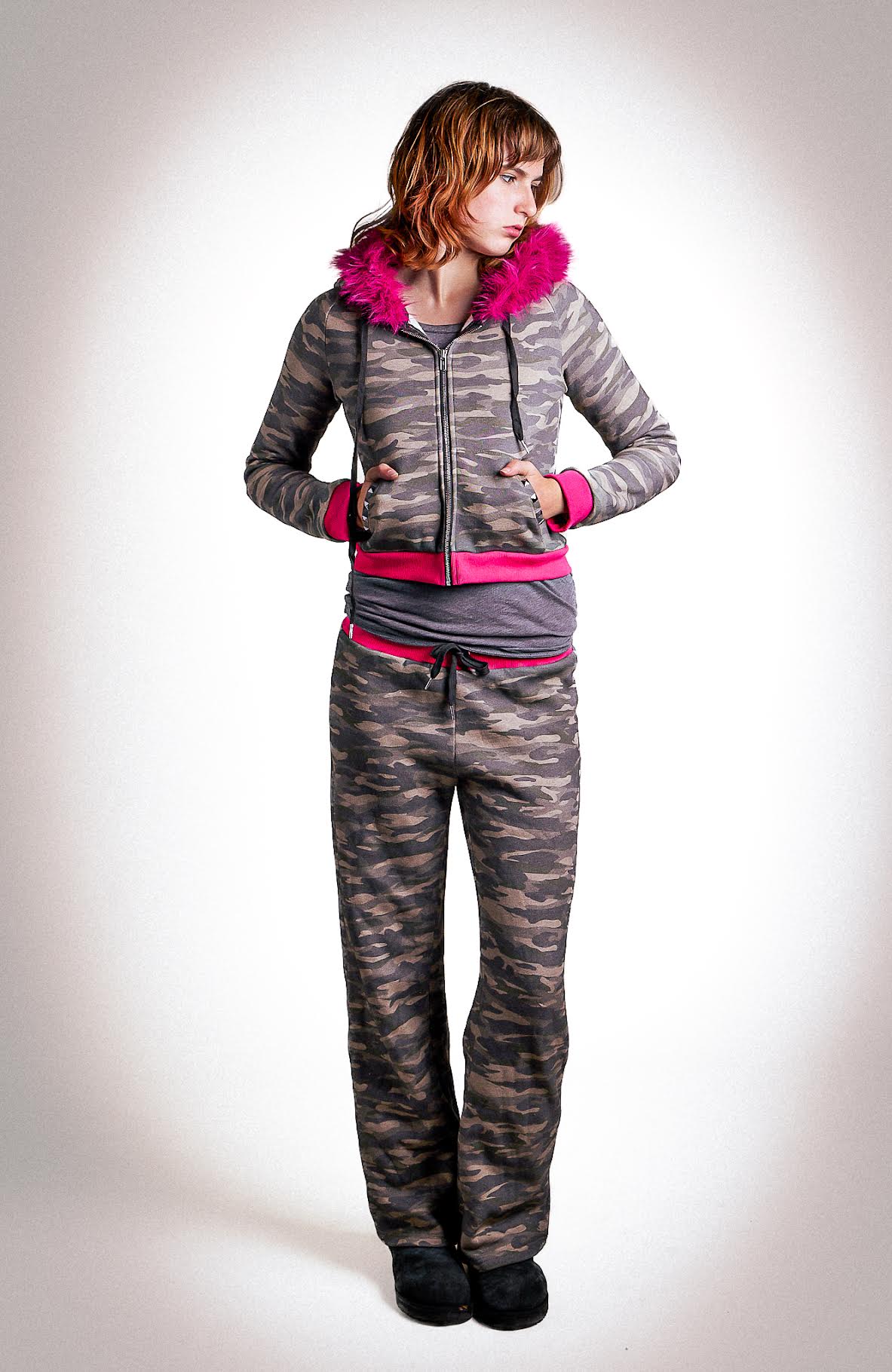 Low-waisted camo and hot pink sweatpants