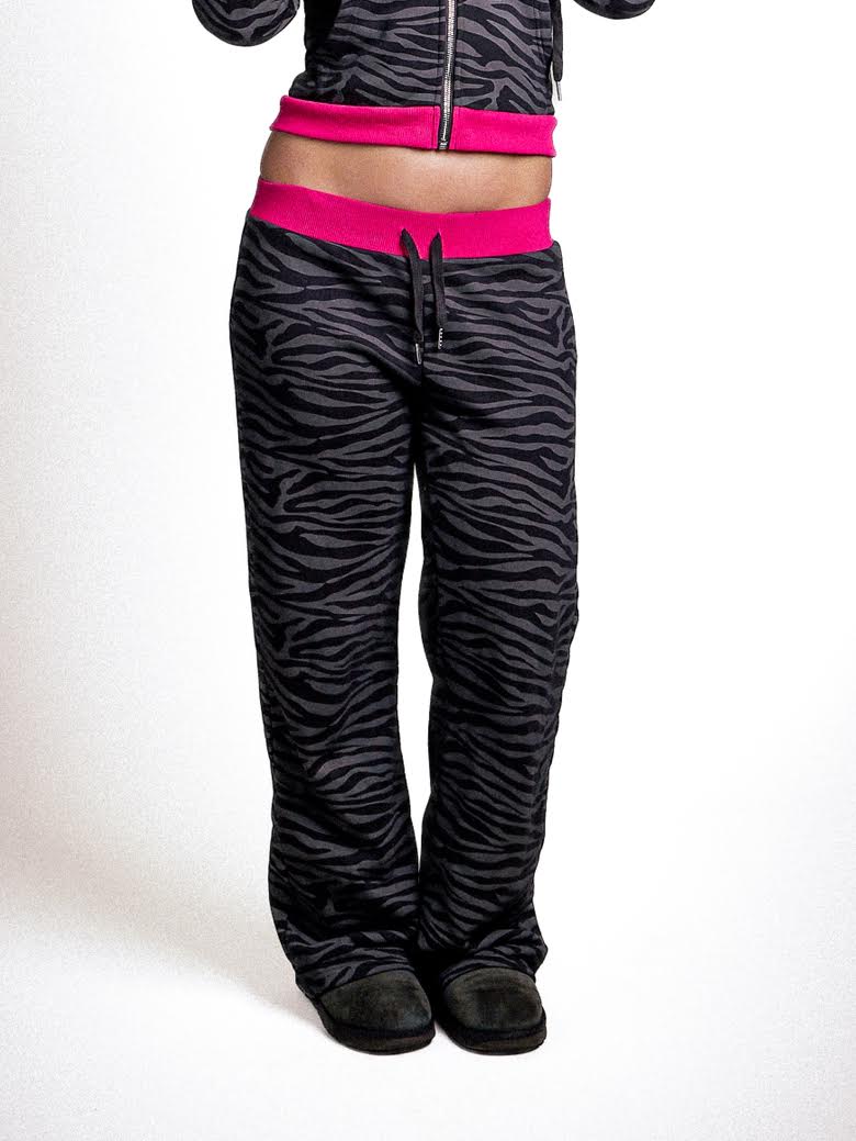 Low-waisted zebra and hot pink sweatpants
