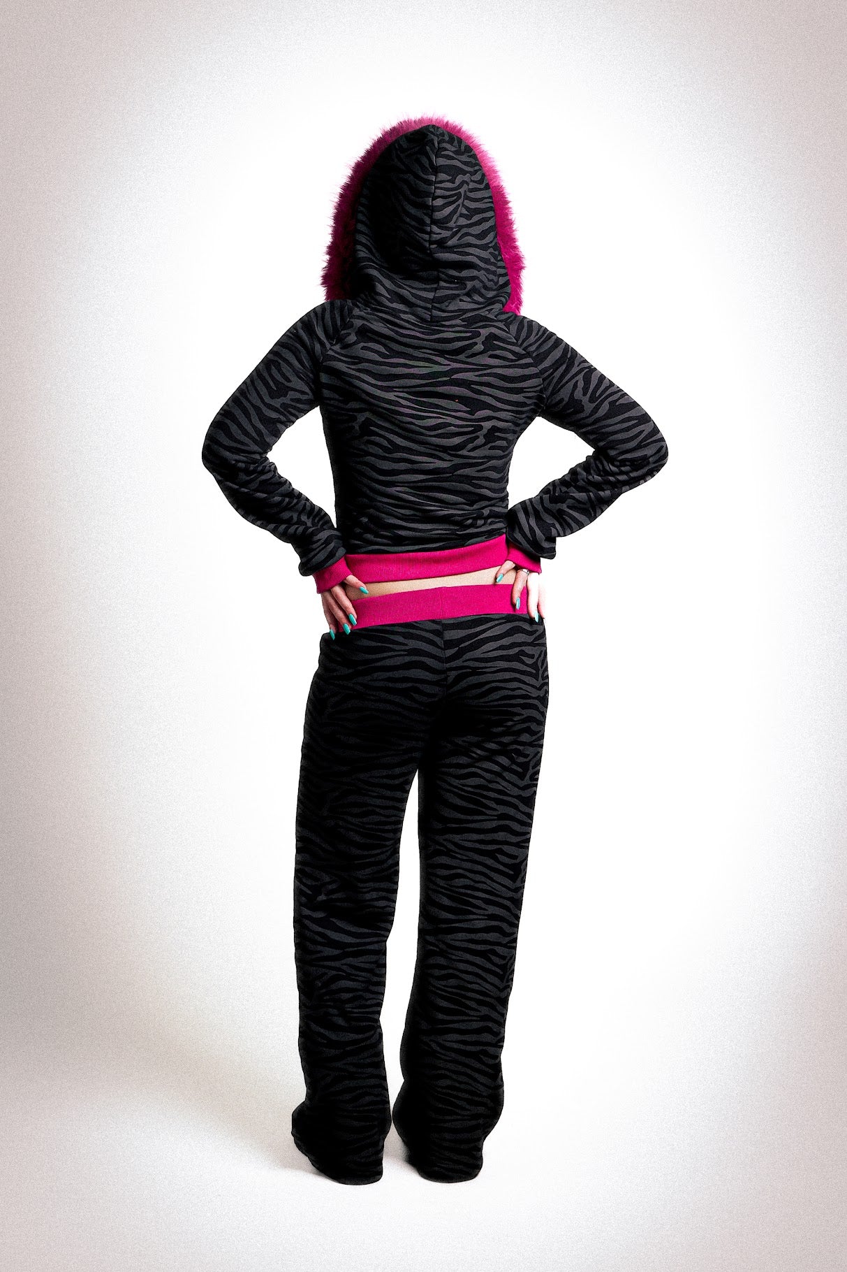 Low-waisted zebra and hot pink sweatpants